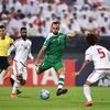 Justin Meram (áo xanh) không thể tham dự Asian Cup 2019 vì chấn thương. (Nguồn: football-tribe.com)