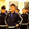 Cầu thủ Triều Tiên đặt chân đến Hà Nội. (Nguồn: VFF)