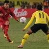 Quang Hải trong trận đấu với Malaysia ở AFF Cup 2018. (Nguồn: Fox Sports)