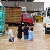 Cảnh ngập lụt sau trận lũ quét tại Camarines Sur, Philippines. (Ảnh: THX/TTXVN)