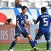 Yuya Osako (số 15) lập cú đúp giúp Nhật Bản ngược dòng thành công. (Nguồn: AFC)