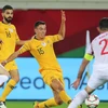 Australia (áo vàng) đá bay Syria khỏi Asian Cup 2019. (Nguồn: AFC)