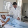 Ông Vũ Văn Cảnh đang được điều trị tại Bệnh viện quốc tế Hoàn Mỹ. (Ảnh: Lê Xuân/TTXVN)