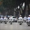 Hình ảnh đoàn xe chở Tổng thống Mỹ trên đường phố Hà Nội