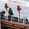 Lực lượng vũ trang Mala giành lại quyền kiểm soát con tàu từ người di cư. (Nguồn: Reuters)