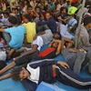 Người di cư tại khu lều tạm Ganzour, Tripoli, Libya ngày 5/9/2018. (Ảnh: AFP/ TTXVN)