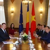 Thủ tướng Nguyễn Xuân Phúc hội kiến với Tổng thống Romania Klaus Werner Iohannis. (Ảnh: Thống Nhất/TTXVN)