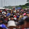 Người di cư tại khu vực Ciudad Hidalgo, bang Chiapas, Mexico, trong hành trình tới Mỹ ngày 19/10/2018. (Ảnh: AFP/TTXVN)