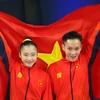 Phan Thế Gia Hiển-Bùi Minh Phương giúp Aerobic lập hat-trick huy chương Vàng. (Ảnh: Vietnam+)