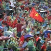 [Photo] Người hâm mộ đội mưa cổ vũ cho đội tuyển U23 Việt Nam