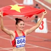Quách Thị Lan giành huy chương Vàng nội dung chạy 400m rào nữ. (Ảnh: Quốc Khánh/TTXVN)