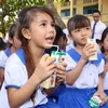 Niềm vui uống sữa của các em học sinh trường tiểu học B Mỹ Hiệp, Ấp Đông Châu, xã Mỹ Hiệp, huyện Chợ Mới, tỉnh An Giang.