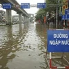 Nhiều con đường lớn ở Hà Nội đã ngập sâu đến cả trăm mm. (Ảnh: PV/Vietnam+)