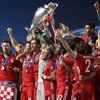Các cầu thủ ăn mừng chiến thắng Champions League (Ảnh: Fcb.com)