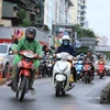 [Photo] Cận cảnh người dân Thủ đô Hà Nội đón đợt rét nhất từ đầu mùa