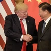 Tổng thống Mỹ Donald Trump và Chủ tịch Trung Quốc Tập Cận Bình trong cuộc gặp tại Bắc Kinh hồi năm 2017. (Ảnh: AFP/ TTXVN) 