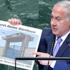Thủ tướng Israel Benjamin Netanyahu đưa ra hình ảnh về kho hạt nhân của Iran. (Ảnh: Reuters)