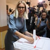Người dân Nga đi bỏ phiếu tại Moskva. (Ảnh: AFP/TTXVN)