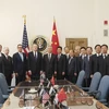 Phái đoàn đàm phán thương mại Mỹ và Trung Quốc.(Ảnh: THX/TTXVN)
