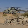 Trực thăng Nga tại căn cứ Tabqa. (Ảnh: AP)