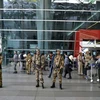 Lực lượng an ninh tăng cường tại sân bay Indira Gandhi. (Ảnh: IANS)