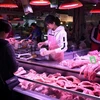 Một cửa hàng thịt ở Trung Quốc. (Ảnh: AFP)