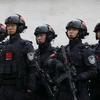 Lực lượng đặc nhiệm Trung Quốc tham gia diễn tập tại Serbia. (Ảnh: AP)