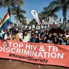Tuần hành nhằm nâng cao nhận thức về căn bệnh HIV/AIDS tại Durban, Nam Phi. (Ảnh: AFP/TTXVN)