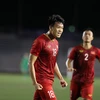 Thành Chung (18) ăn mừng sau pha ghi bàn gỡ hoà cho U22 Việt Nam. (Ảnh: Hoàng Linh/TTXVN)