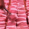 Giá thịt lợn Trung Quốc đang ngày càng tăng. (Ảnh: Reuters)