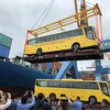 Lễ xuất khẩu xe Bus thương hiệu Việt sang Philippines. (Ảnh: Trần Tĩnh/TTXVN)
