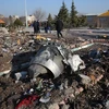 Hiện trường vụ rơi máy bay Ukraine ở Iran. (Nguồn: AP)