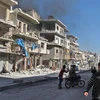 Khung cảnh sau một vụ không kích tại Idlib.