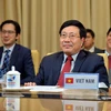 Phó Thủ tướng, Bộ trưởng Ngoại giao Phạm Bình Minh tham dự hội nghị trực tuyến. (Ảnh: TTXVN phát)