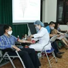 Học viên Học viện Chính trị Quốc gia Hồ Chí Minh tham gia hiến máu tình nguyện. (Ảnh: Phương Hoa/TTXVN)