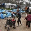 Trẻ em di cư tại một trại tị nạn ở Hy Lạp. Ảnh: AFP/ TTXVN