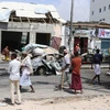 Hiện trường một vụ đánh bom xe tại Somalia. (Ảnh: AFP/TTXVN)