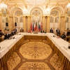 Phiên họp trực tuyến của các thành viên còn lại trong JCPOA. (Ảnh: China Daily)