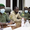 Cuộc đàm phán giữa nhóm đảo chính Mali và ECOWAS hồi tháng 8. (Ảnh: AFP/TTXVN)