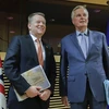 Các trưởng đoàn đàm phán Brexit của Anh và EU. (Ảnh: AFP/TTXVN)