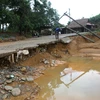 Hạ tầng ở các xã miền núi huyện Vĩnh Linh hư hại nghiêm trọng do mưa lũ. (Ảnh: Hồ Cầu/TTXVN)