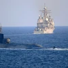 Tàu ngầm USS Georgia và tàu tuần dương USS Port Royal. (Ảnh: AP)