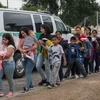 Người nhập cư đang tìm cách vào Mỹ. (Ảnh: AFP/Getty)