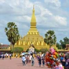 Người dân tại thủ đô Vientiane. (Ảnh: Thu Phương/TTXVN)