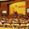 Chủ tịch nước Nguyễn Phú Trọng trình Quốc hội miễn nhiệm chức vụ Thủ tướng Chính phủ đối với ông Nguyễn Xuân Phúc. (Ảnh: Trí Dũng/TTXVN)