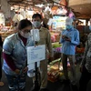 Thủ đô Phnom Penh đóng cửa chợ đầu mối để phòng chống dịch. (Ảnh: AFP/TTXVN)