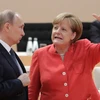 Thủ tướng Angela Merkel và Tổng thống Vladimir Putin. (Ảnh: AP)