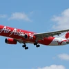 Lượng khách AirAsia chuyên chở tăng 25% trong năm 2013