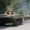 Xe quân sự tại ngoại ô Donetsk, Ukraine ngày 21/7. (Ảnh: THX/TTXVN)
