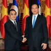 Thủ tướng Chính phủ Nguyễn Tấn Dũng hội đàm với Thủ tướng Lào Thongsing Thammavong. (Ảnh: Đức Tám/TTXVN) 